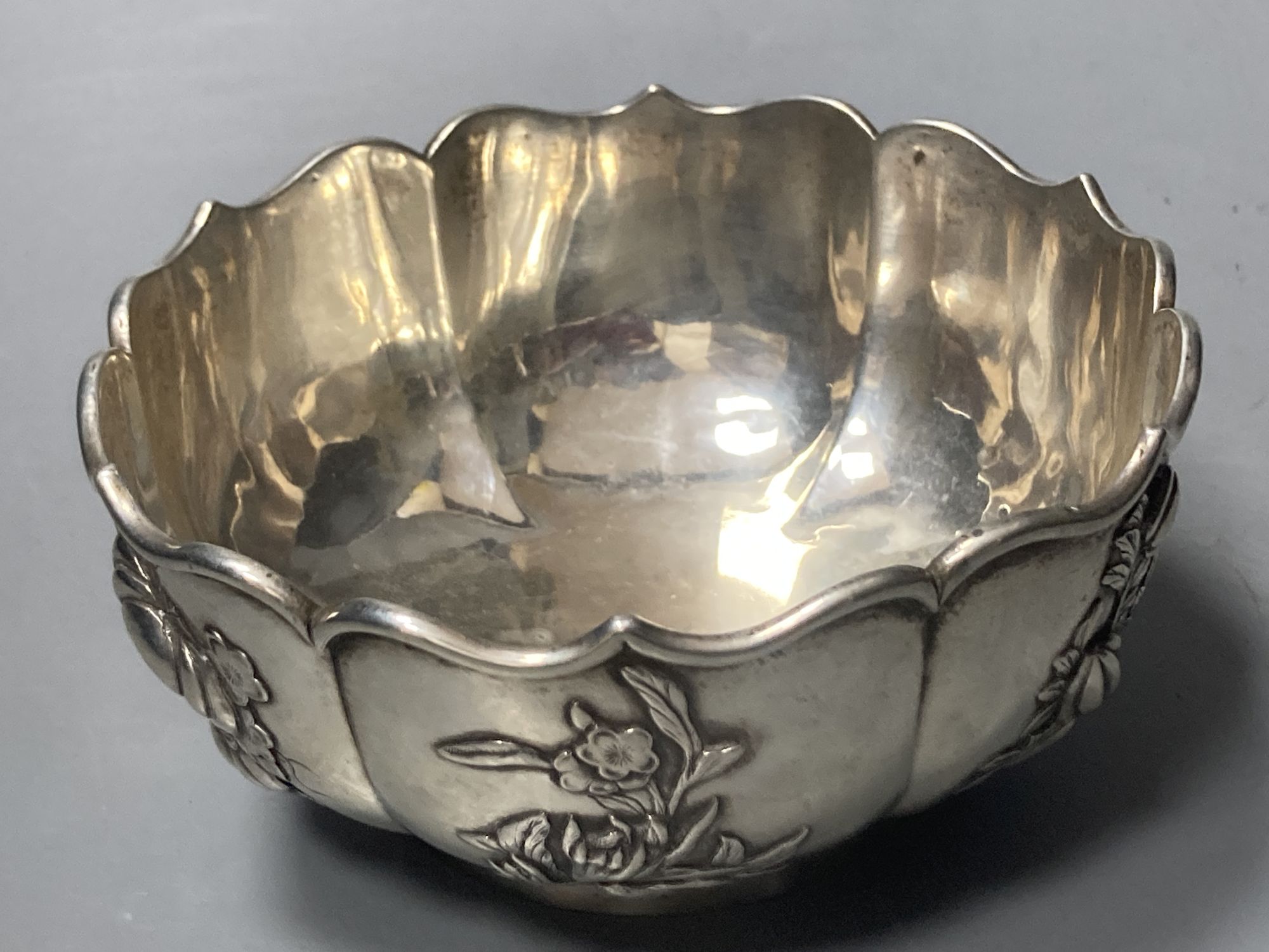 An early 20th century Chinese Export white metal bowl, by Zee Wo, with foliate decoration, diameter 11.5cm, 5.5oz.